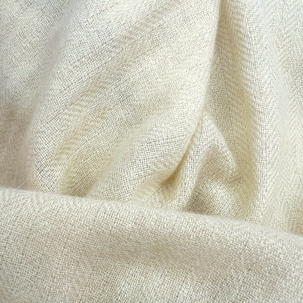 Himalayan cashmere scarf in Champagne, featuring herringbone pattern