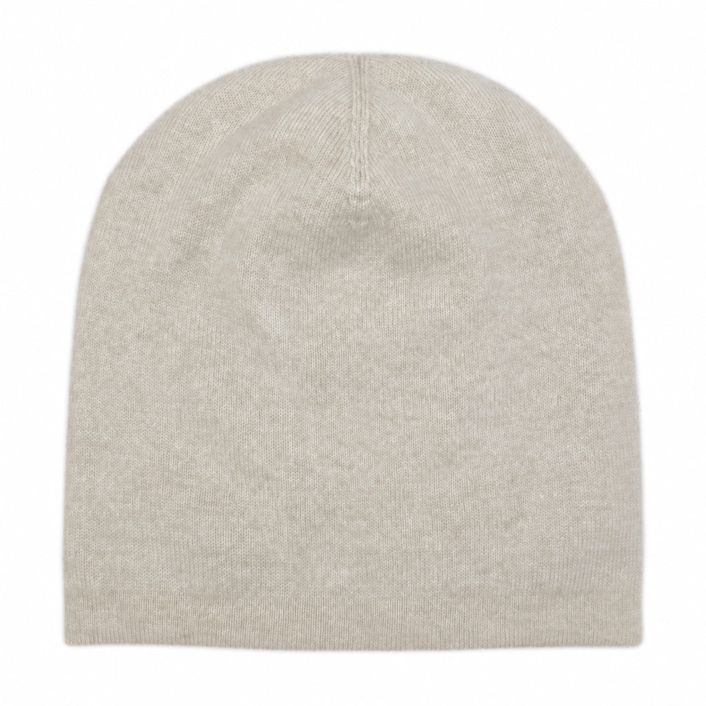 A plain knit beanie hat in a light oatmeal beige color, shown from the back against a solid white background.