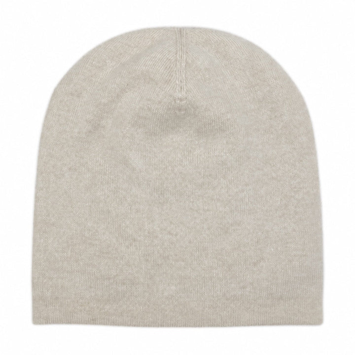 A plain knit beanie hat in a light oatmeal beige color, shown from the back against a solid white background.