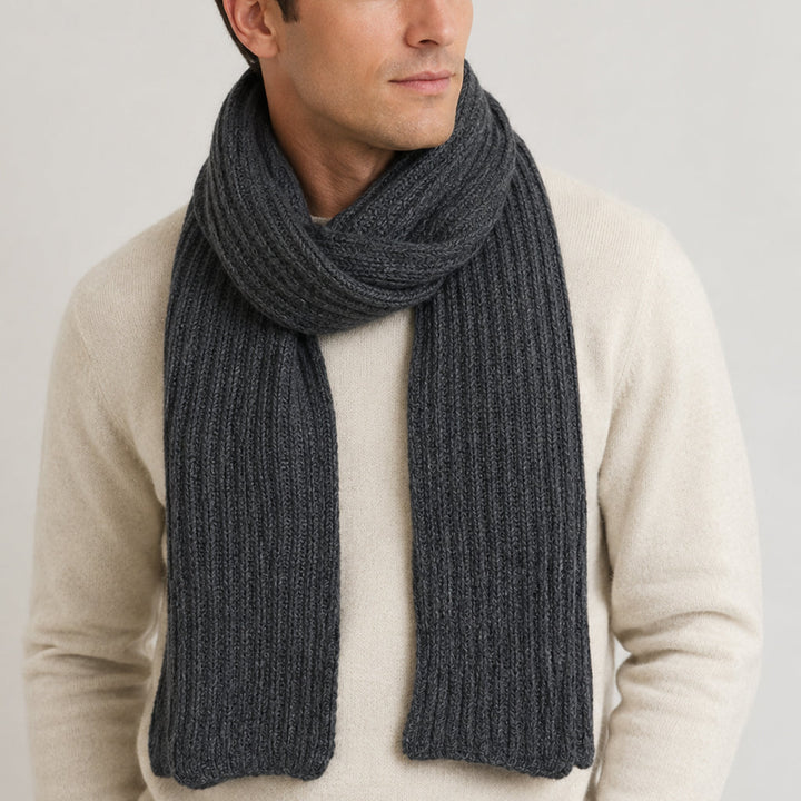 Himalayan cashmere scarf in Graphite; deep charcoal gray, featuring ribbed knit