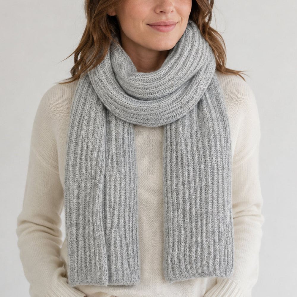 Himalayan cashmere scarf in Heather gray, featuring ribbed knit worn by a model
