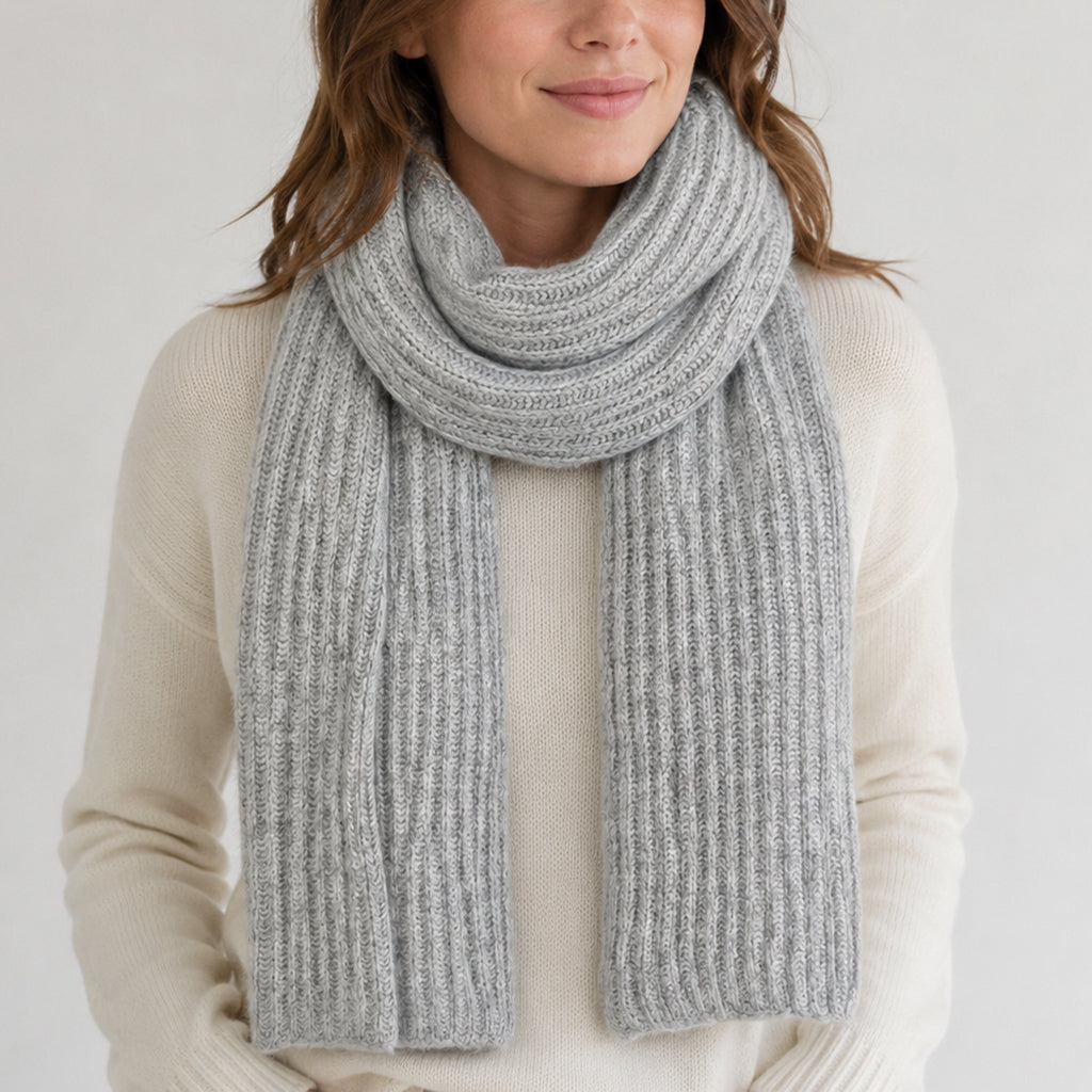 Himalayan cashmere scarf in Heather gray, featuring ribbed knit worn by a model