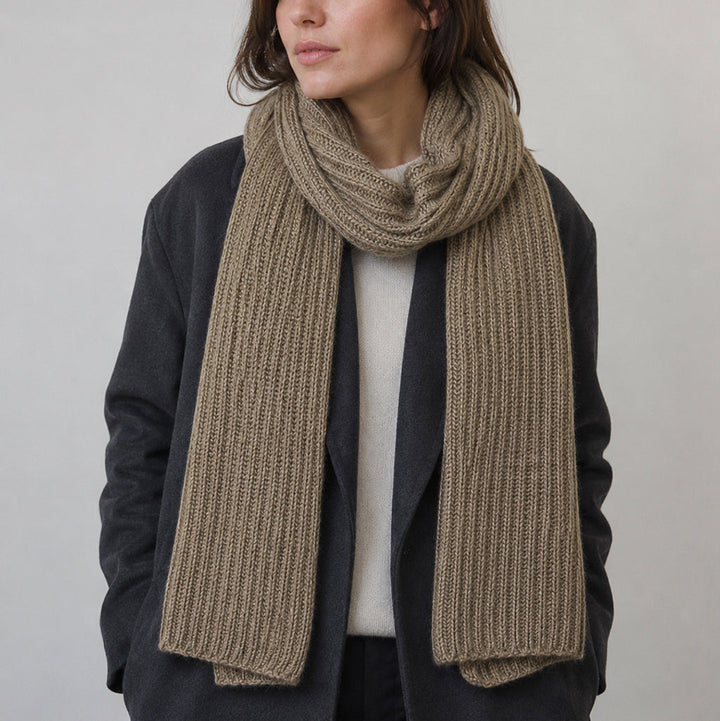 Mocha brown cashmere scarf showing a visible ribbed pattern