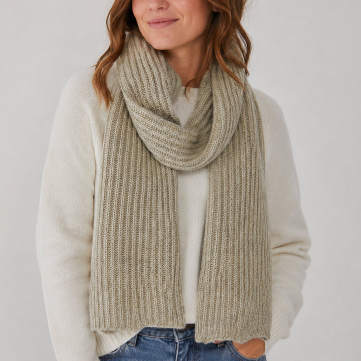 Himalayan cashmere scarf in Oatmeal and beige, featuring marled ribbed knit shown on a model