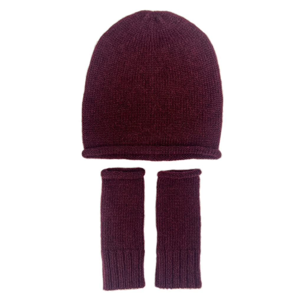 A knit beanie with matching fingerless gloves  in a deep burgundy color, displayed against a solid white background.